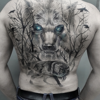 Татуировка в стиле тату реализм волк