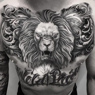 Татуировка в стиле блек энд грей лев