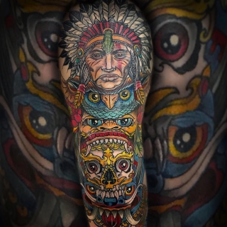 Татуировка в стиле цветная татуировка тотем