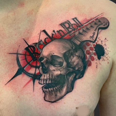 Татуировка в стиле трэш полька тату череп с гитарой