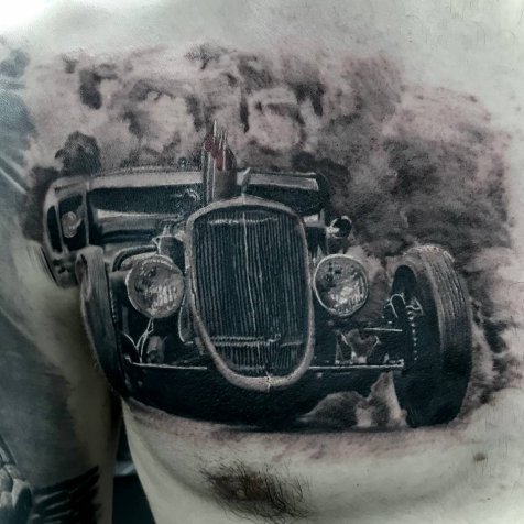 Татуировка в стиле тату реализм автомобиль