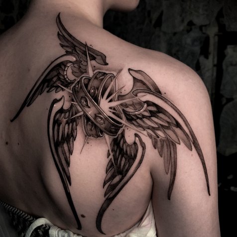 Татуировка в стиле тату графика 