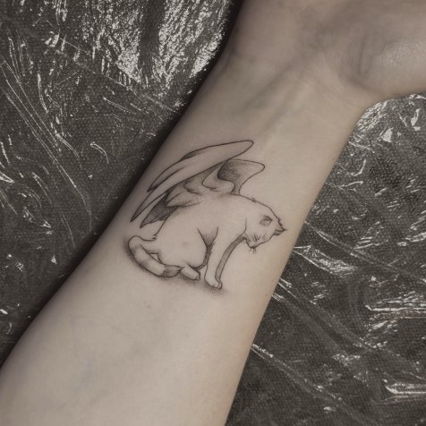 Татуировка в стиле тату графика 